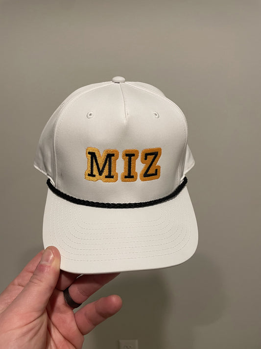 white gold and black rope hat